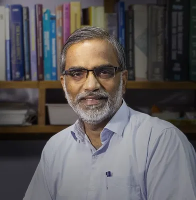 Dr. Pradeep T